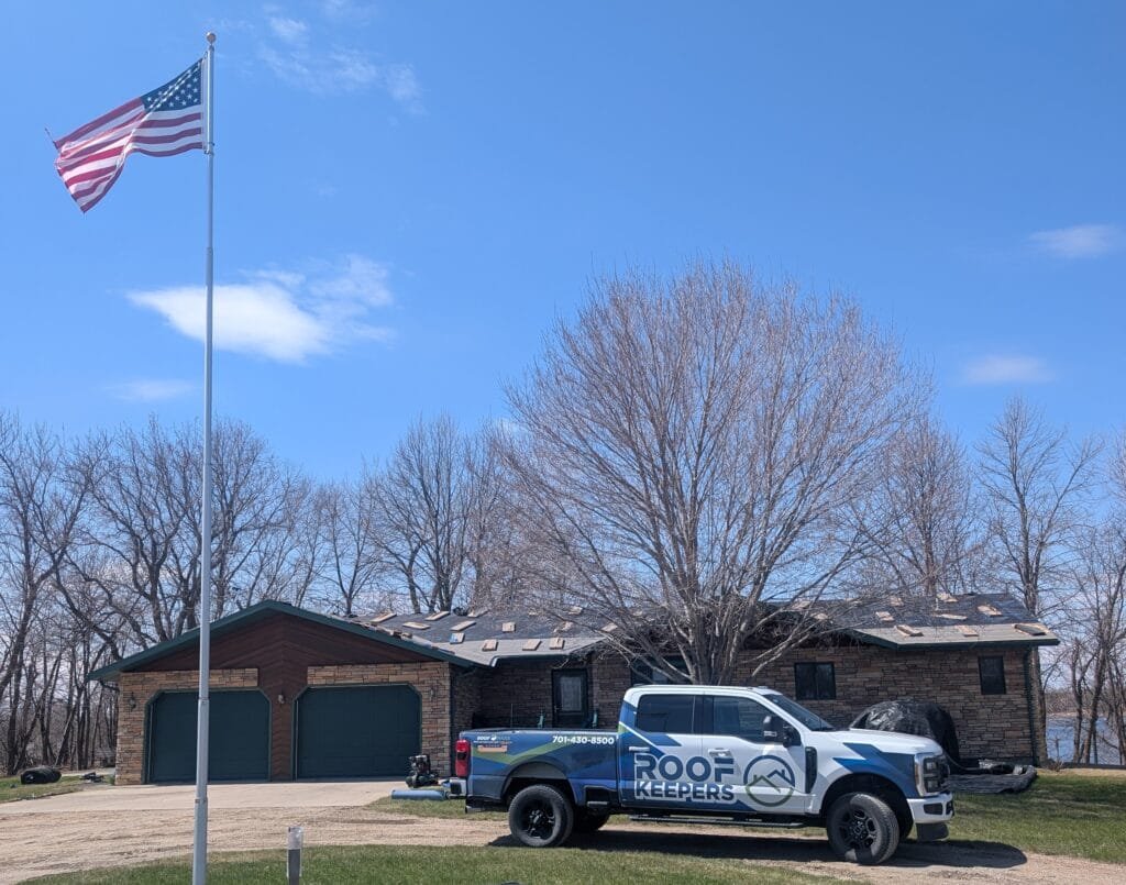 flag roofkeepers truck new roof 1